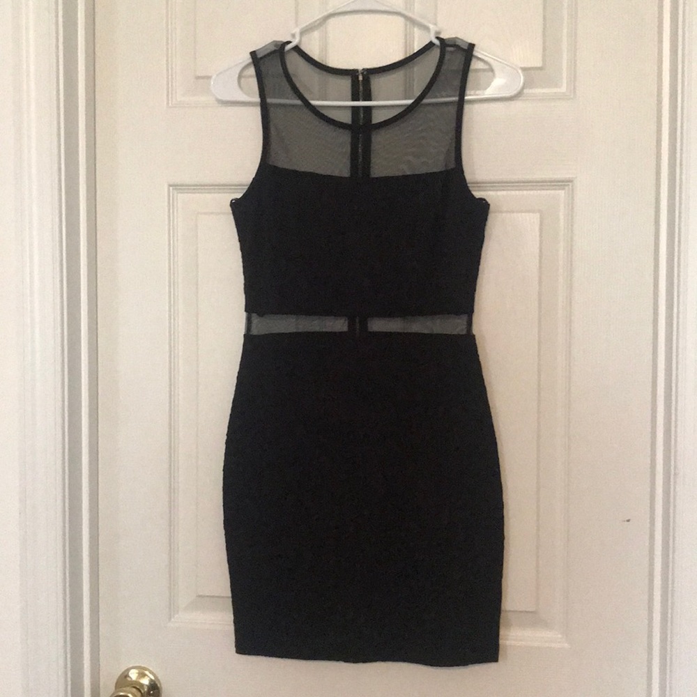 Black Forever 21 dress with sheer panels.